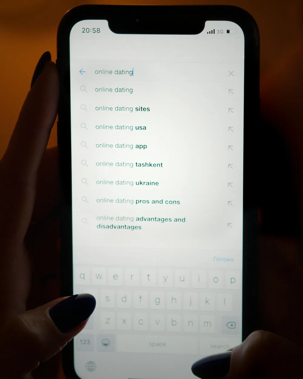 Stock photo of a person browsing dating options on a smartphone